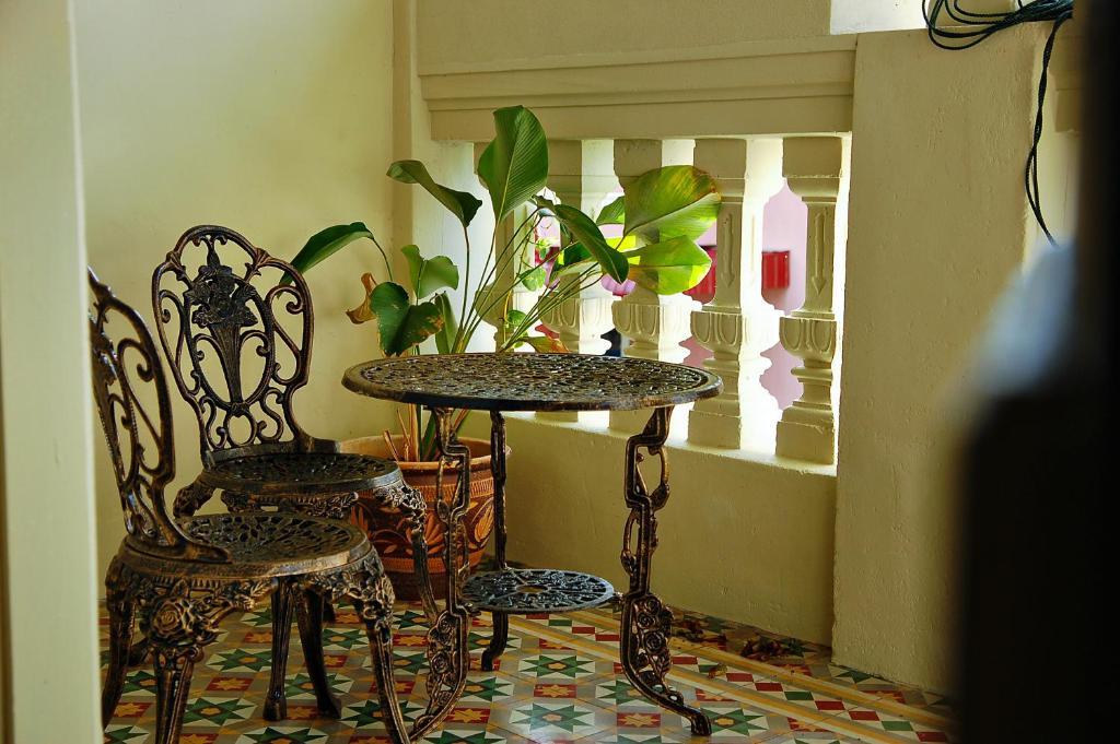 Palanquinn Heritage Suites George Town Quarto foto